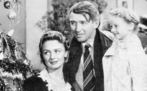 It's a Wonderful Life - George Bailey (James Stewart), Mary Bailey (Donna Reed), and their youngest daughter Zuzu (Karolyn Grimes)